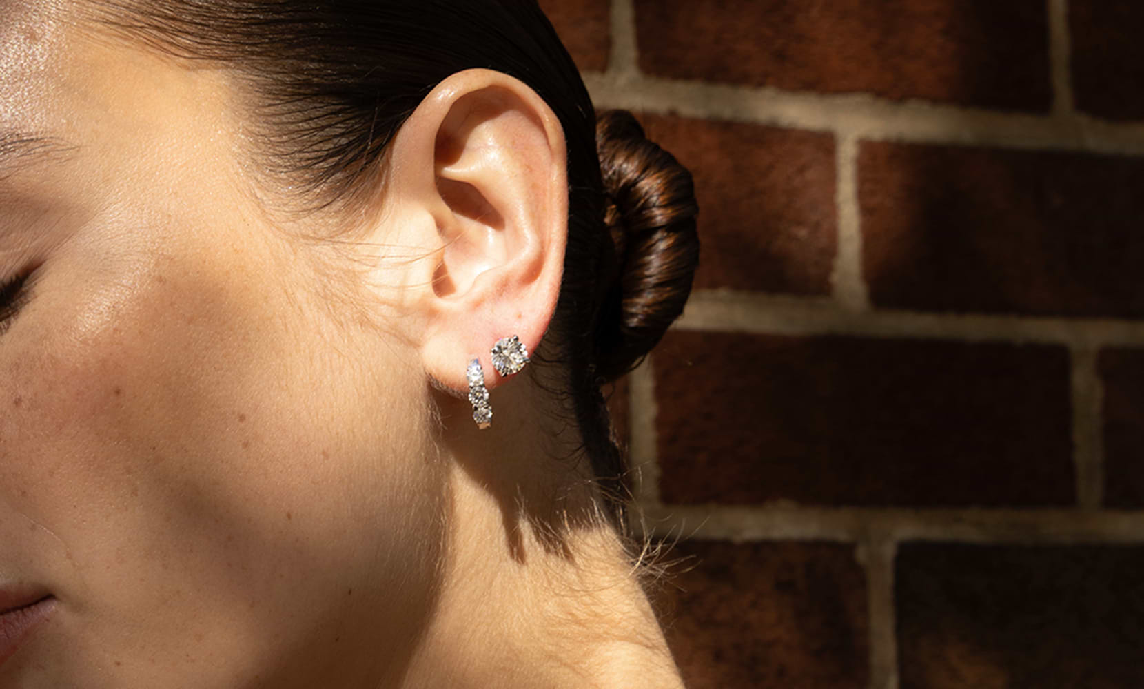 Model wearing Grown Brilliance lab-grown diamond hoop earrings