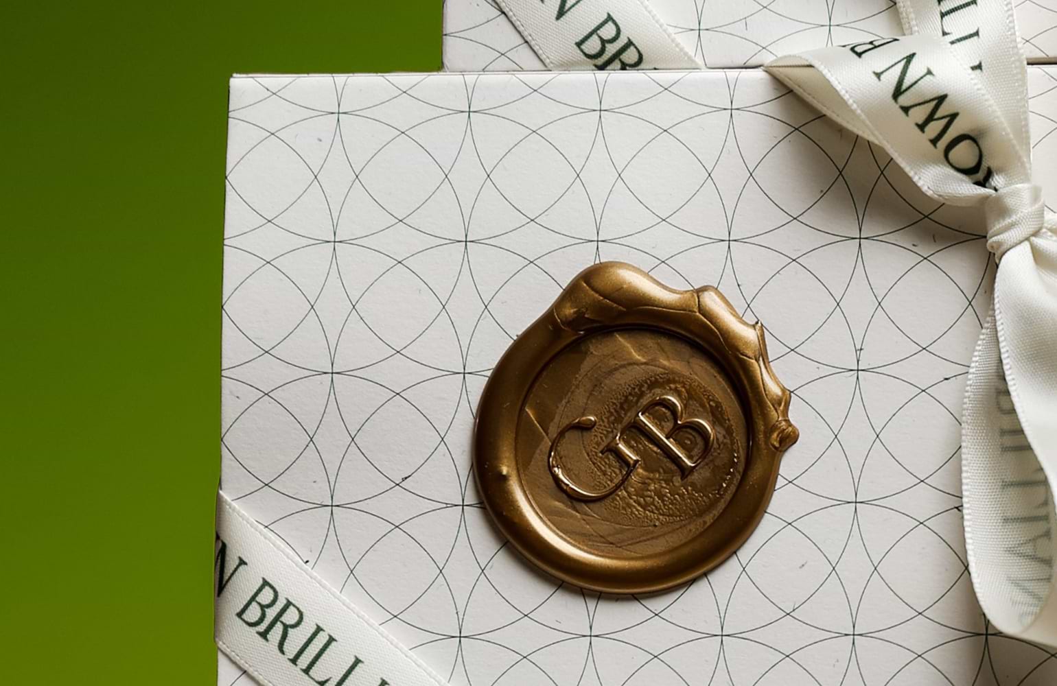 Grown Brilliance packaging with gold GB wax seal.