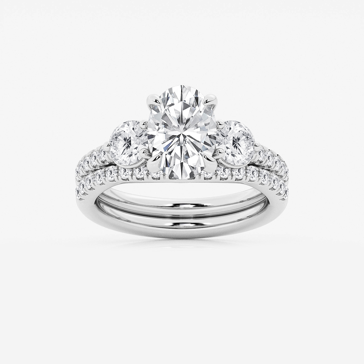 3 1/8 ctw Oval Lab Grown Diamond Three-Stone Bridal Set