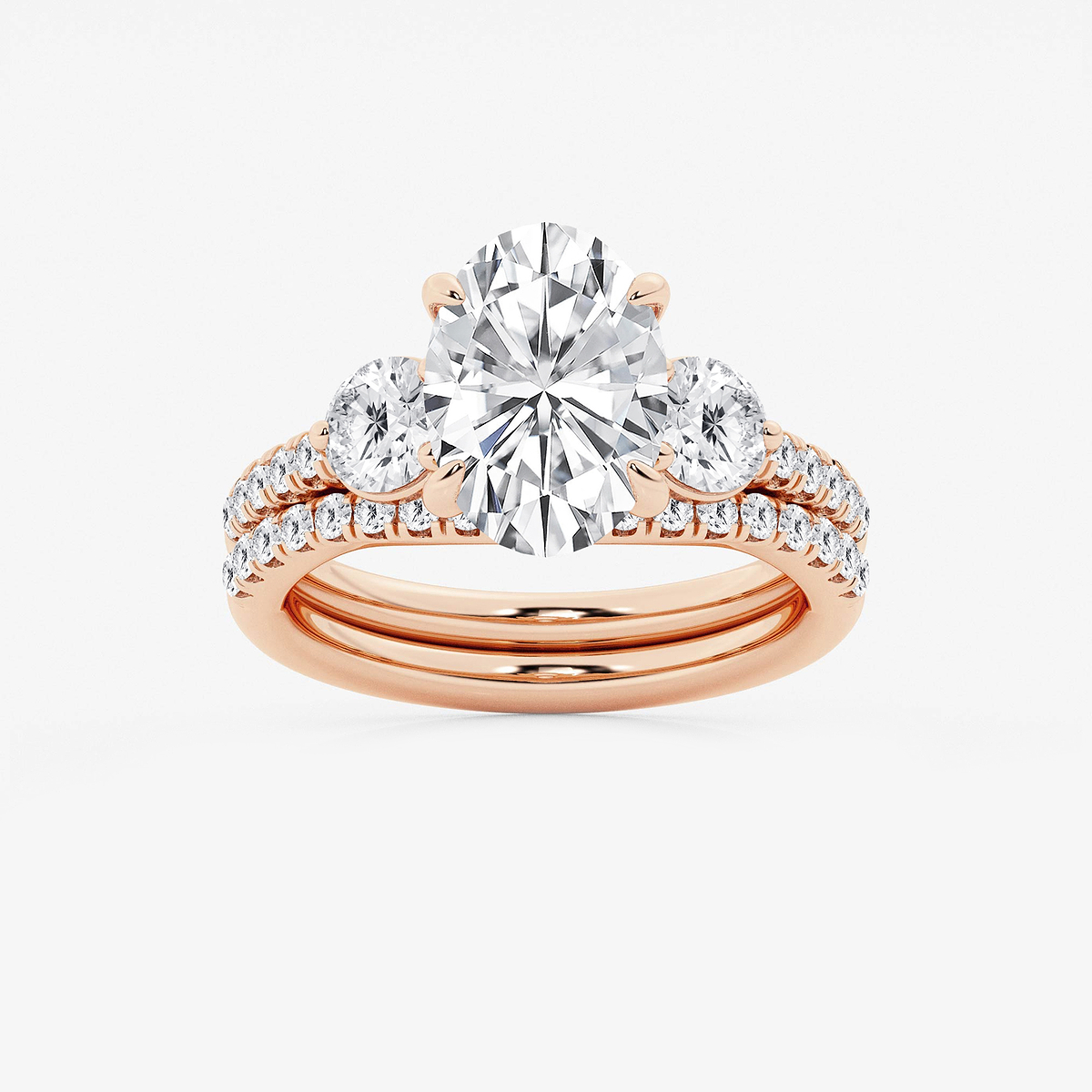 4 1/8 ctw Oval Lab Grown Diamond Three-Stone Bridal Set