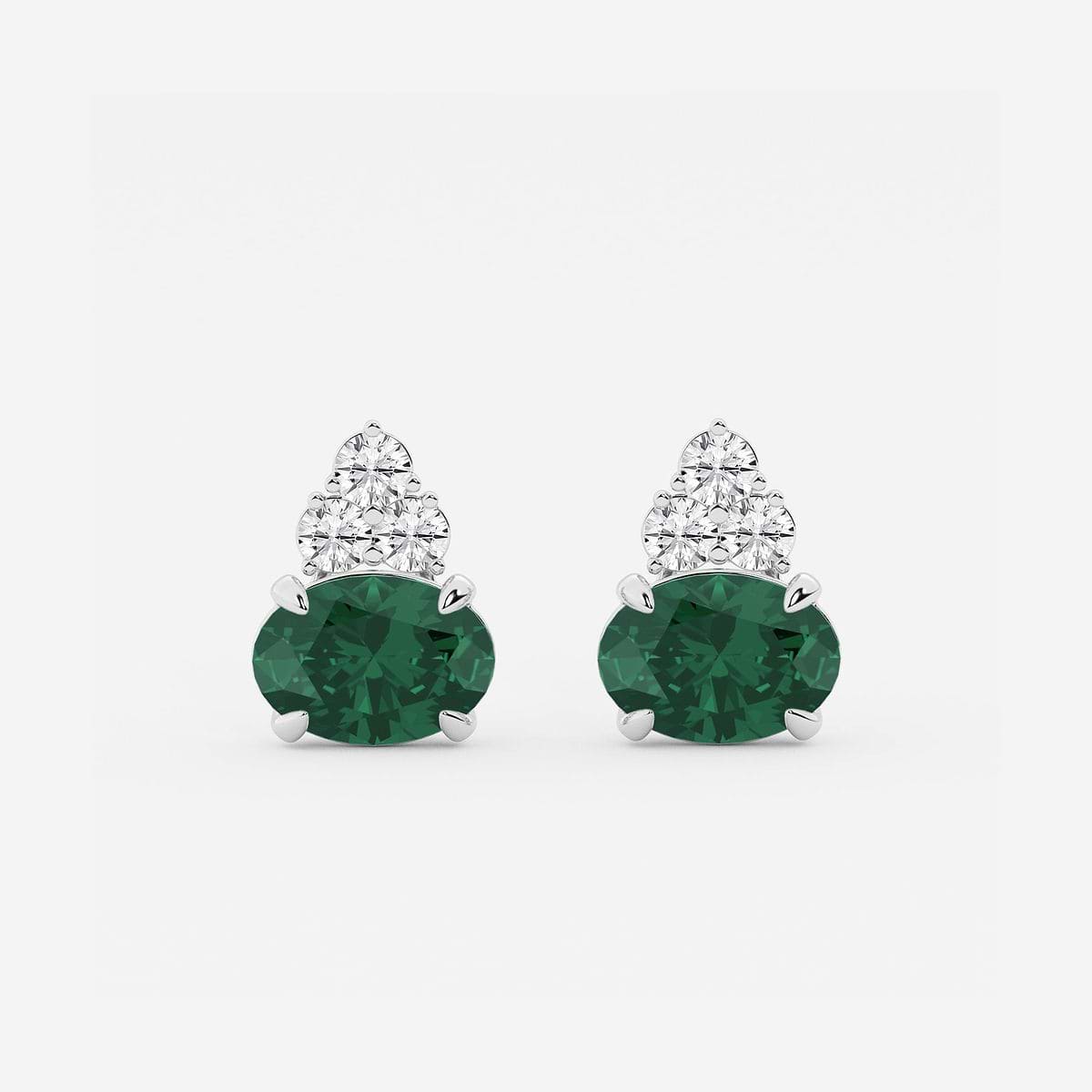 10.7x7.49mm East-West Oval Cut Created Emerald with 3/4 ctw Round Lab Grown Diamond Cluster Fashion Earrings