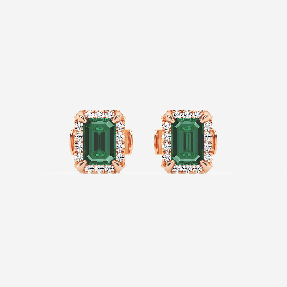 6x4 mm Created Emerald and 1/4 ctw Round Lab Grown Diamond Shadow Halo Stud Earrings