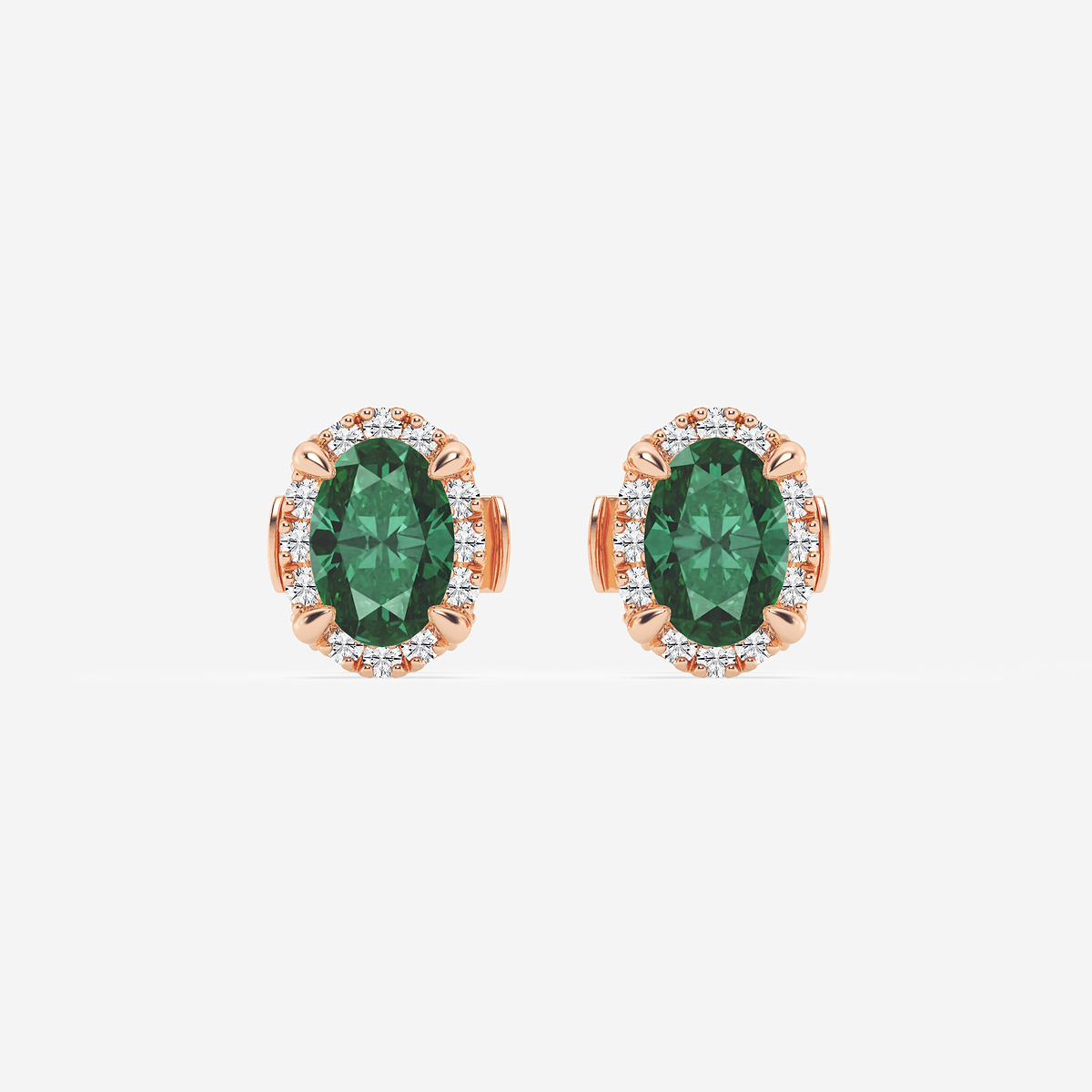 6x4 mm Oval Created Emerald and 1/4 ctw Round Lab Grown Diamond Shadow Halo Stud Earrings