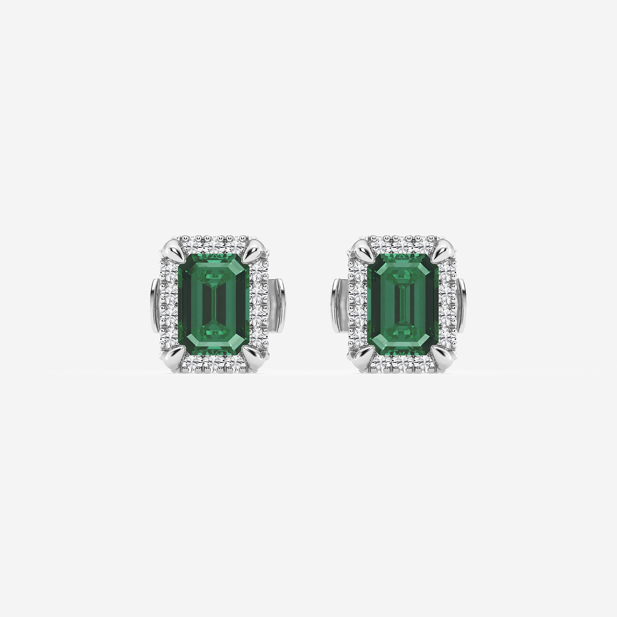 6x4 mm Created Emerald and 1/4 ctw Round Lab Grown Diamond Shadow Halo Stud Earrings