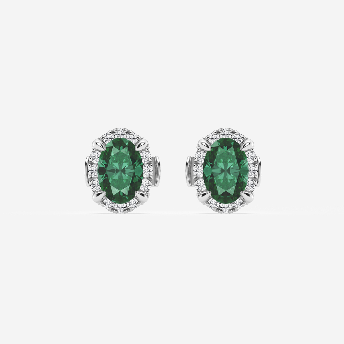 6x4 mm Oval Created Emerald and 1/4 ctw Round Lab Grown Diamond Shadow Halo Stud Earrings