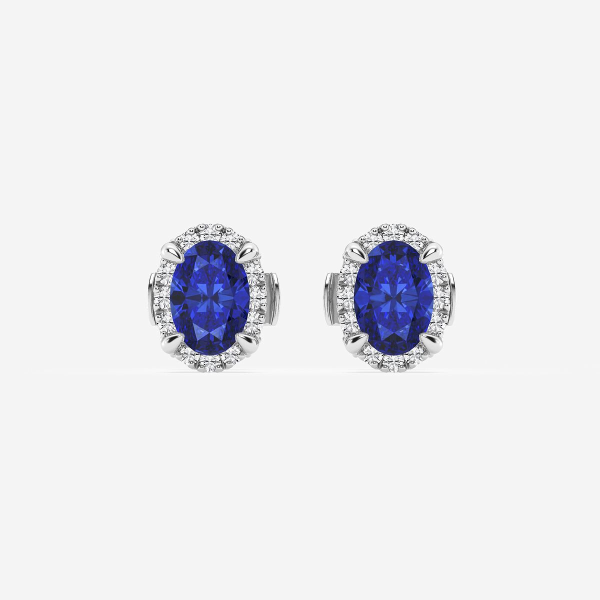 6x4 mm Oval Created Sapphire and 1/4 ctw Round Lab Grown Diamond Shadow Halo Stud Earrings