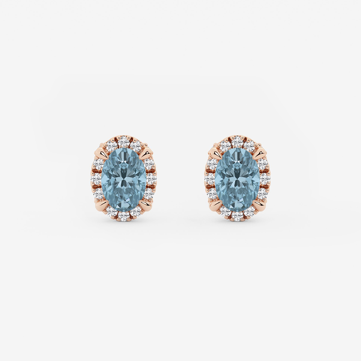 6x4 mm Oval Created Aquamarine and 1/4 ctw Round Lab Grown Diamond Shadow Halo Stud Earrings