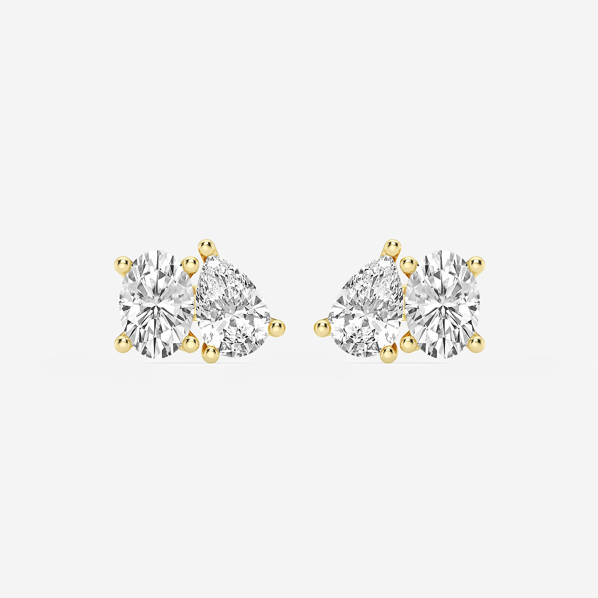 1 1/2 ctw Toi Et Moi Oval and Pear Stud Earrings