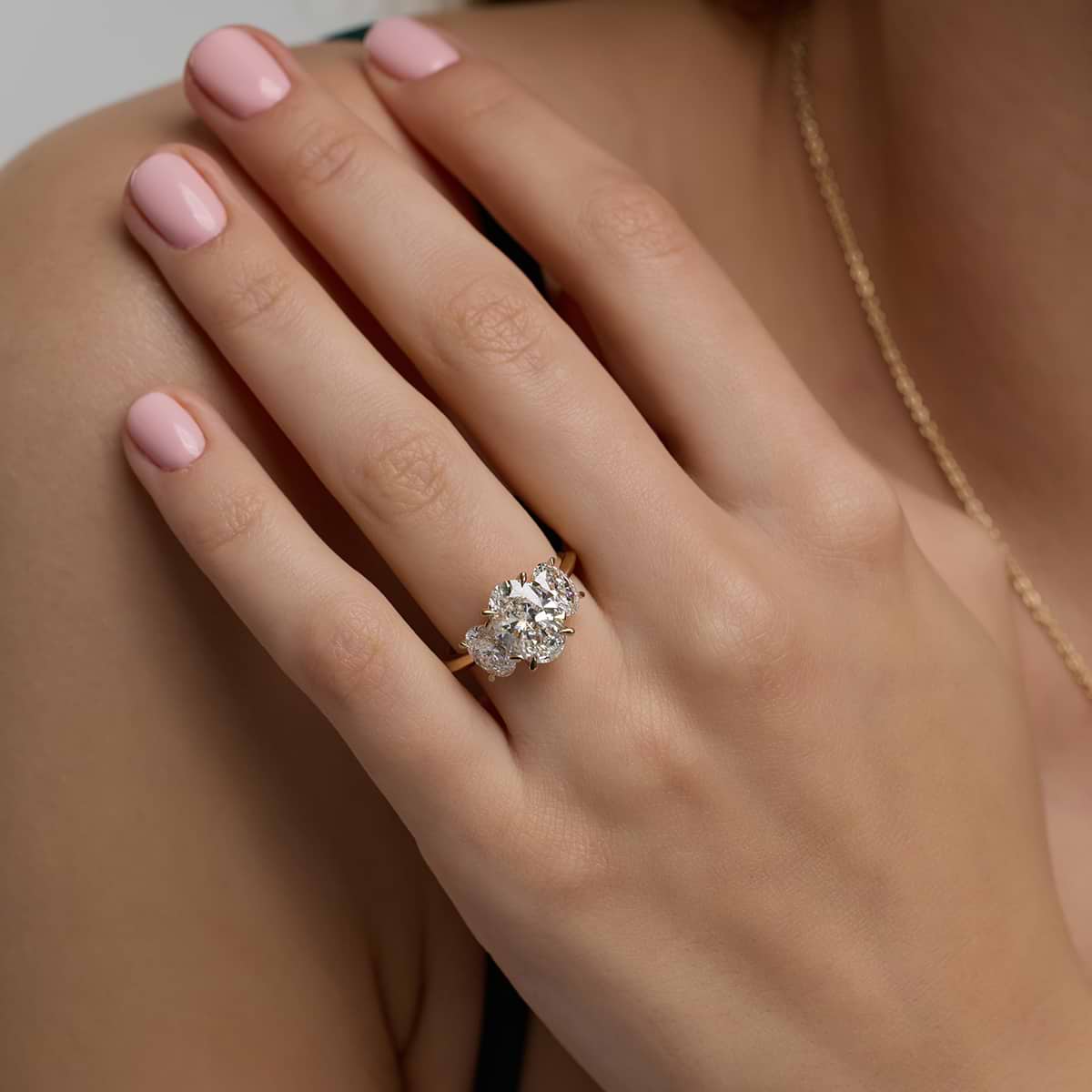 4 ctw Oval Lab Grown Diamond Three-Stone Ring 18K Yellow Gold, F, VS2
