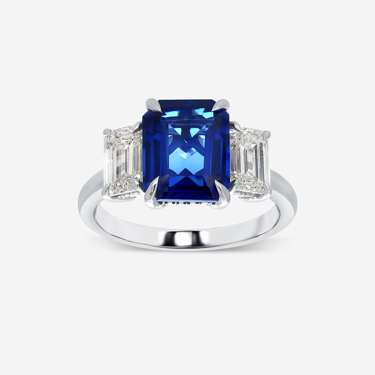 10X8mm Emerald Cut Created Sapphire and 1 7/8 ctw Round Lab Grown Diamond Three-Stone Engagement Ring