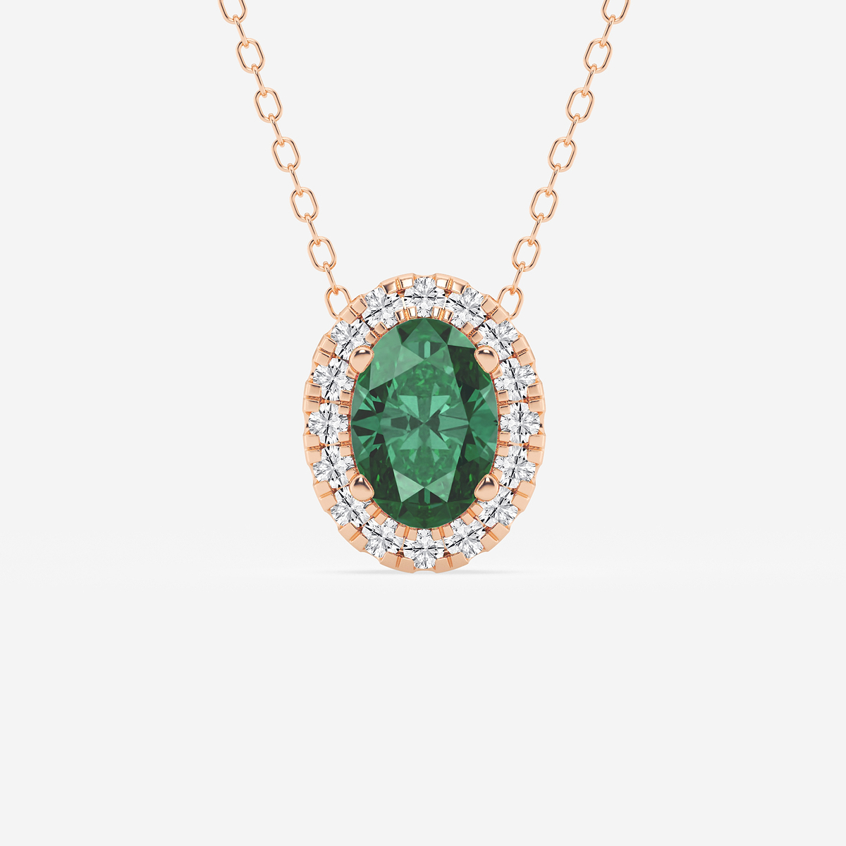 7.9x5.53 mm Oval Created Emerald and 1/5 ctw Round Lab Grown Diamond Halo Pendant with Adjustable Chain