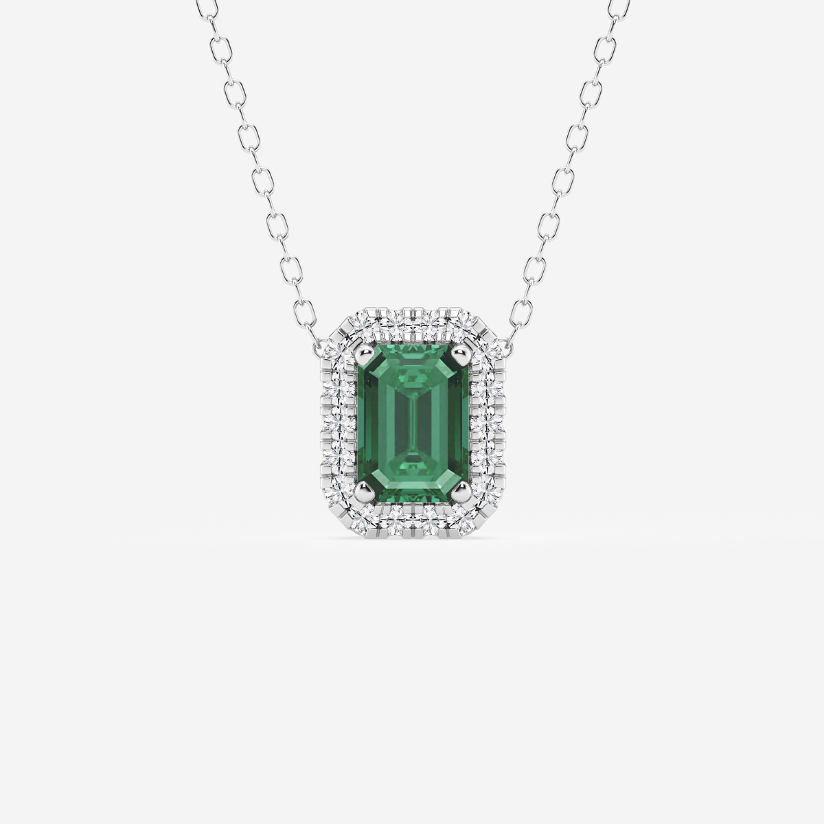 6.7x4.69 mm Created Emerald and 1/5 ctw Round Lab Grown Diamond Halo Pendant with Adjustable Chain