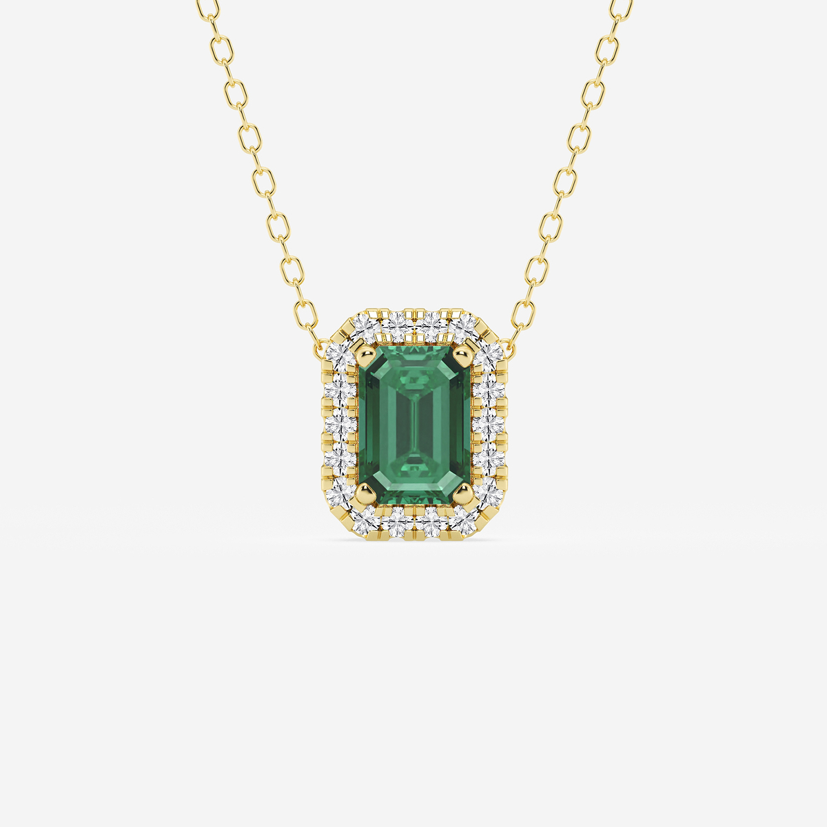 6.7x4.69 mm Created Emerald and 1/5 ctw Round Lab Grown Diamond Halo Pendant with Adjustable Chain