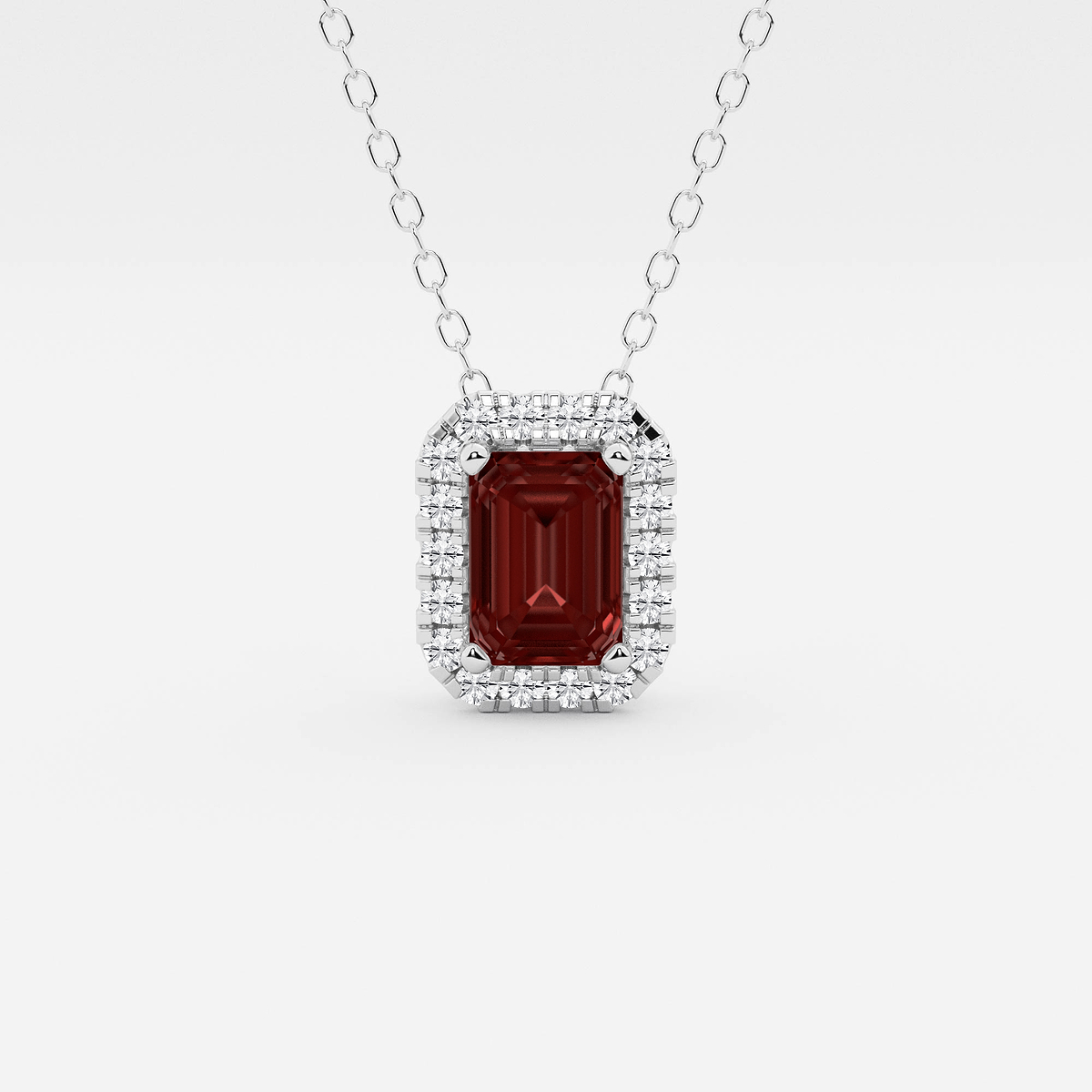 6.7x4.69 mm Emerald Cut Created Garnite and 1/5 ctw Round Lab Grown Diamond Halo Pendant with Adjustable Chain