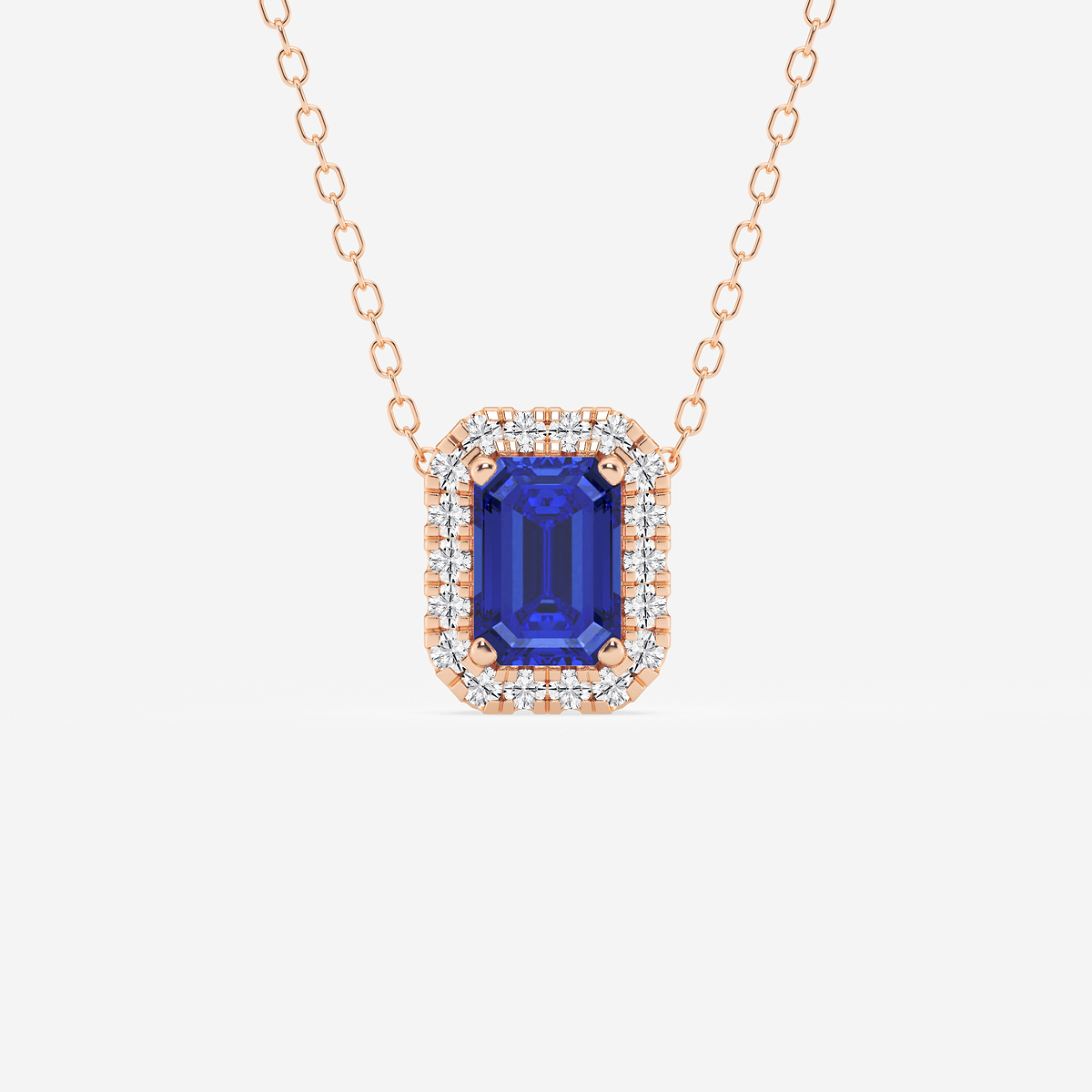 6.7x4.69 mm Emerald Cut Created Sapphire and 1/5 ctw Round Lab Grown Diamond Halo Pendant with Adjustable Chain