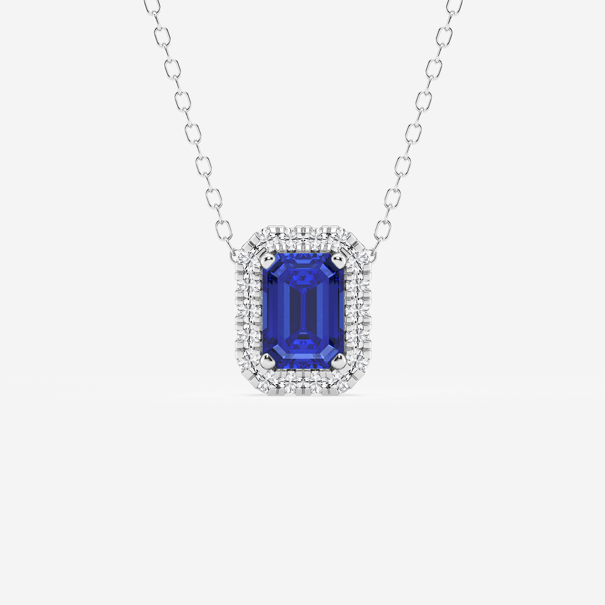 6.7x4.69 mm Emerald Cut Created Sapphire and 1/5 ctw Round Lab Grown Diamond Halo Pendant with Adjustable Chain