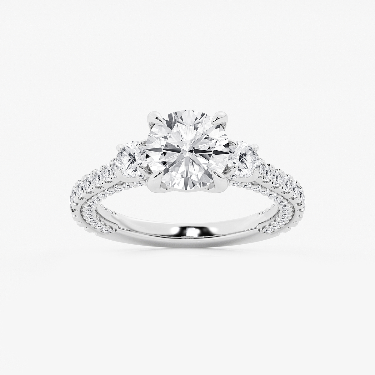 3 1/10 ctw Round Lab Grown Diamond Three Stone Engagement Ring with Side Diamonds