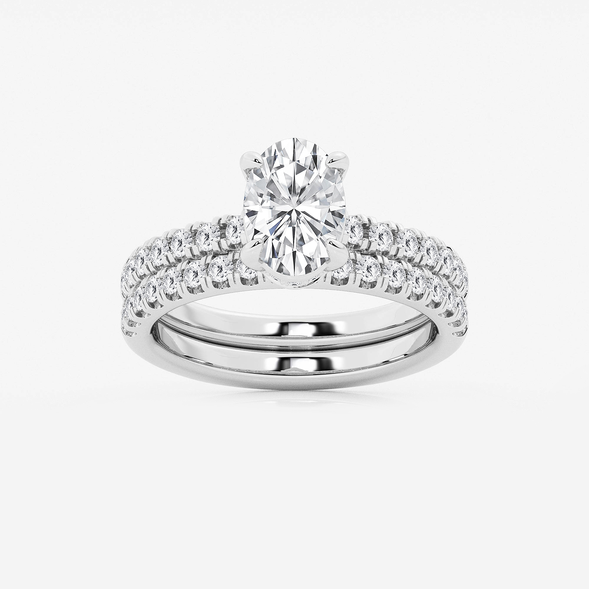 2 1/4 ctw Oval Lab Grown Diamond Hidden Halo Bridal Set