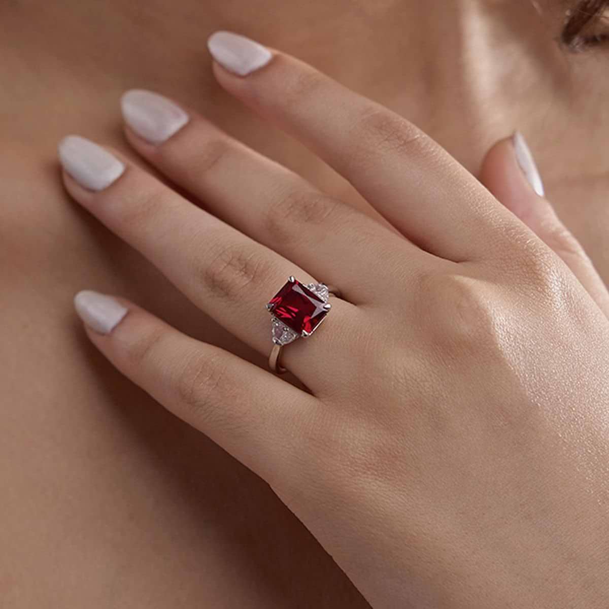 10x8mm Radiant Cut Created Ruby and 5/8 ctw Lab Grown Diamond Three-Stone Engagement Ring