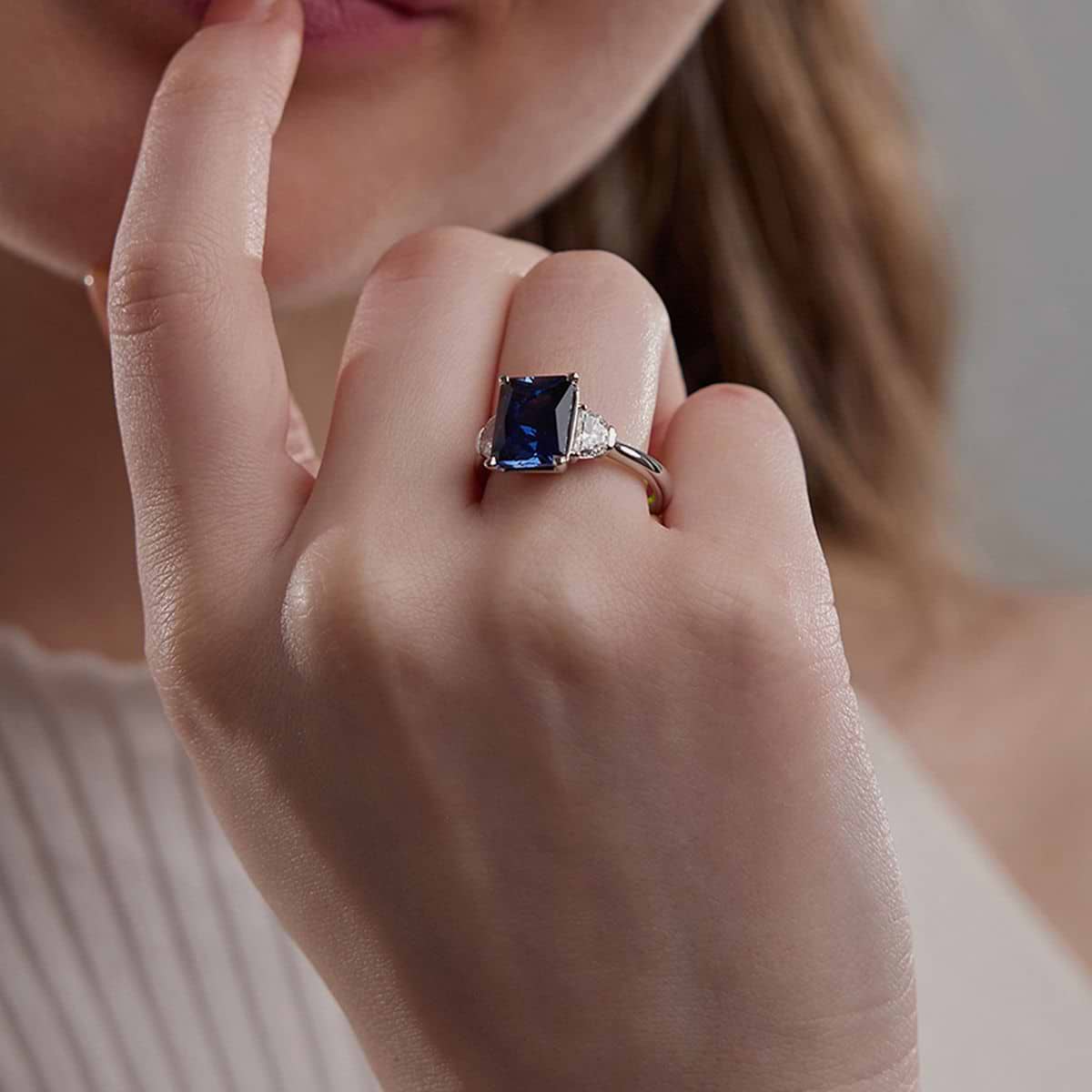 10x8mm Radiant Cut Created Sapphire and 5/8 ctw Lab Grown Diamond Three-Stone Engagement Ring 14K Yellow Gold