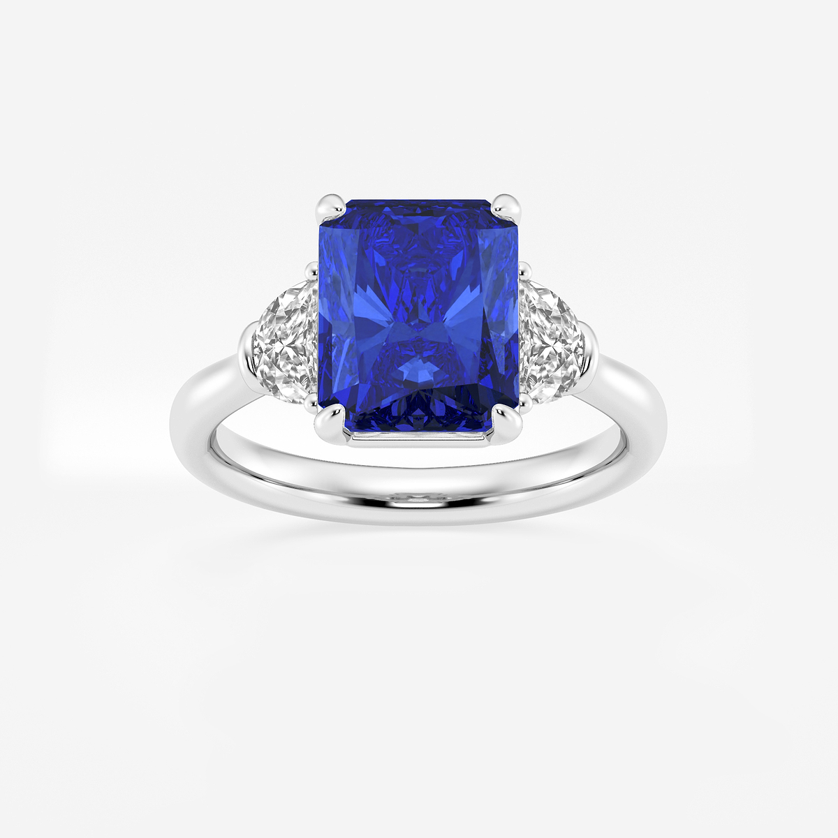 10x8mm Radiant Cut Created Sapphire and 5/8 ctw Lab Grown Diamond Three-Stone Engagement Ring