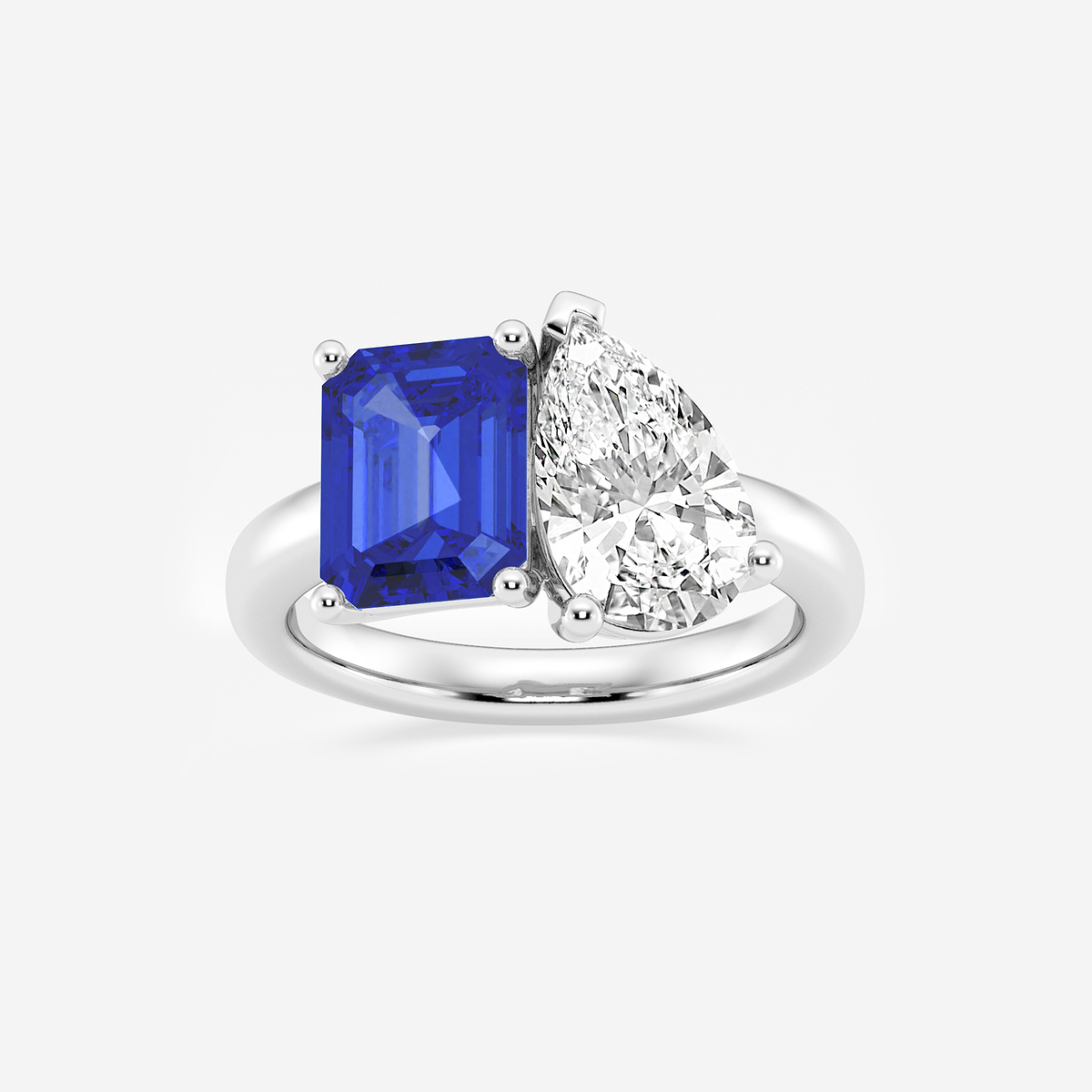 9x7mm Emerald Cut Created Sapphire and 2 1/2 ctw Pear Cut Lab Grown Diamond Two Stone Engagement Ring