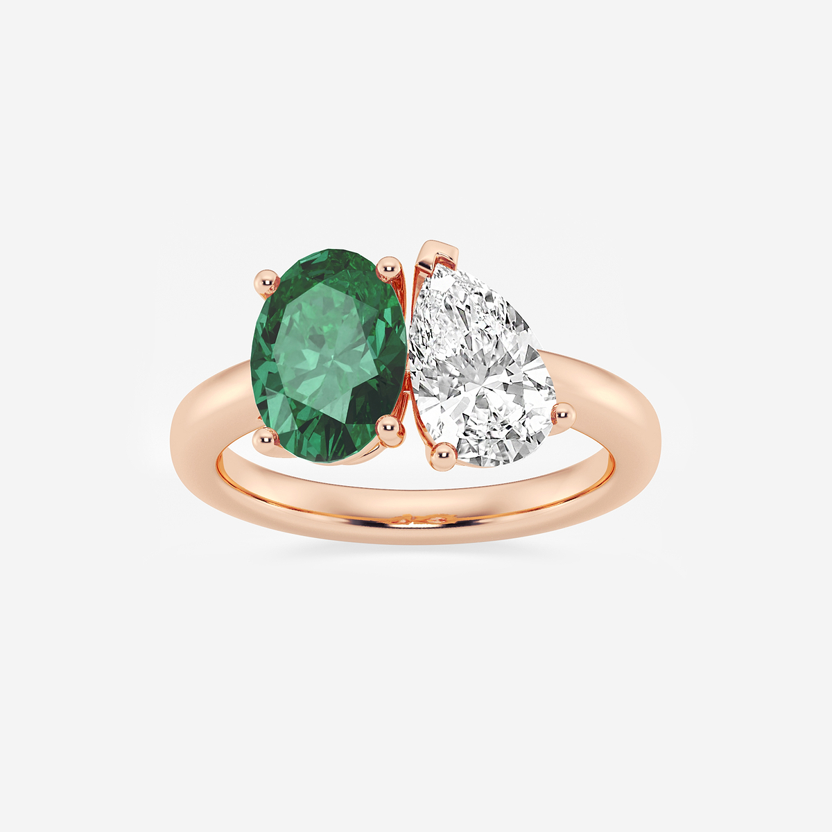 9x7mm Oval Cut Created Emerald and 1 1/2 ctw Pear Cut Lab Grown Diamond Two Stone Engagement Ring