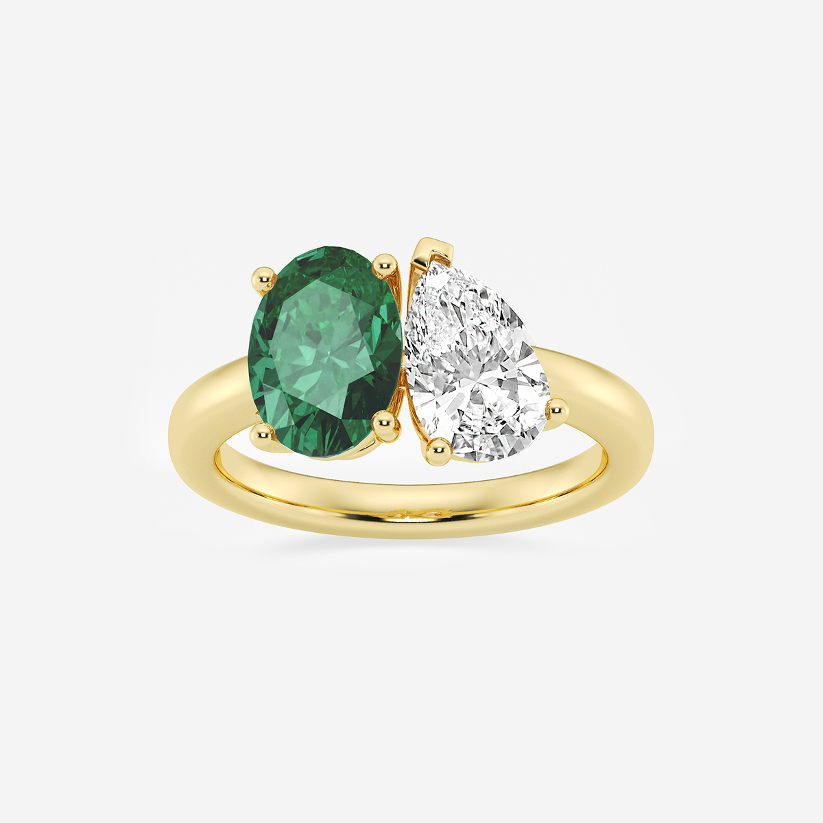 9x7mm Oval Cut Created Emerald and 1 1/2 ctw Pear Cut Lab Grown Diamond Two Stone Engagement Ring