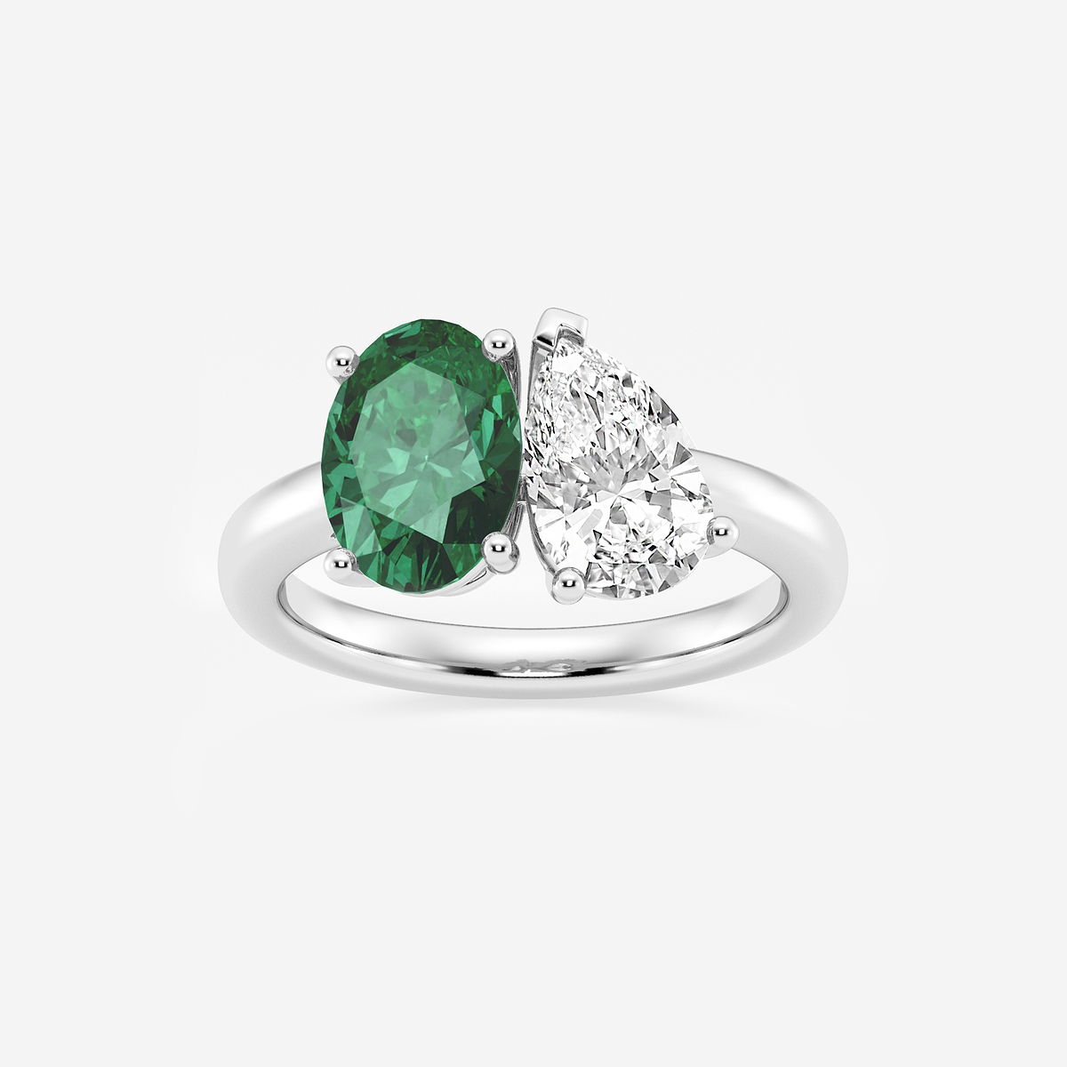 9x7mm Oval Cut Created Emerald and 1 1/2 ctw Pear Cut Lab Grown Diamond Two Stone Engagement Ring
