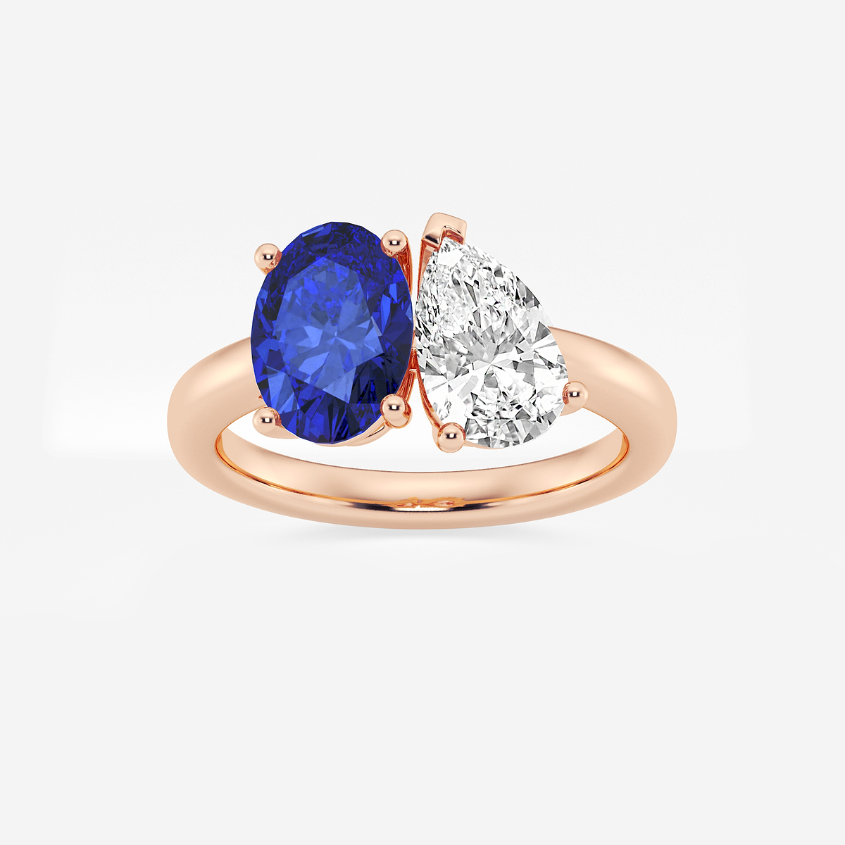 9x7mm Oval Cut Created Sapphire and 1 1/2 ctw Pear Cut Lab Grown Diamond Two Stone Engagement Ring