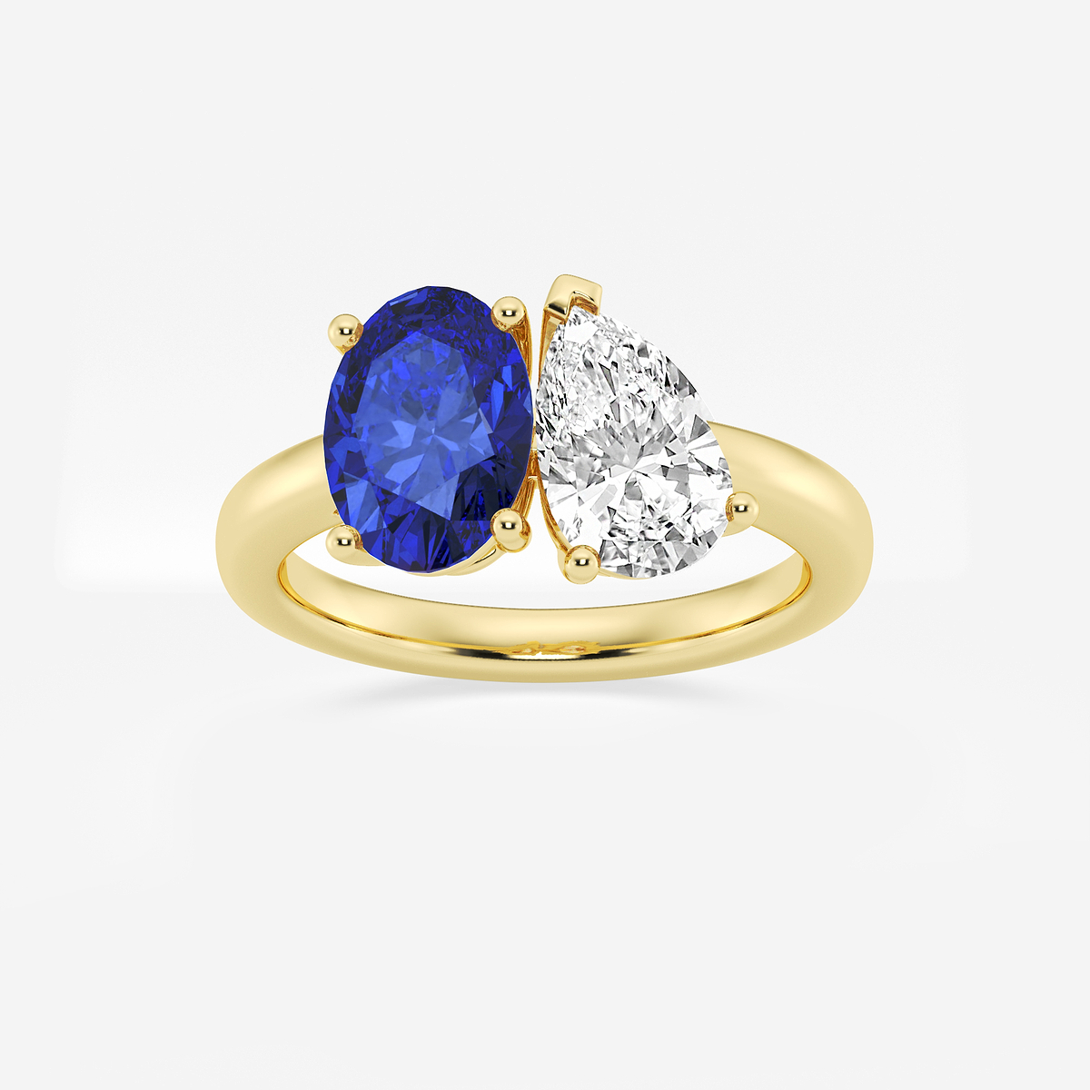 9x7mm Oval Cut Created Sapphire and 1 1/2 ctw Pear Cut Lab Grown Diamond Two Stone Engagement Ring