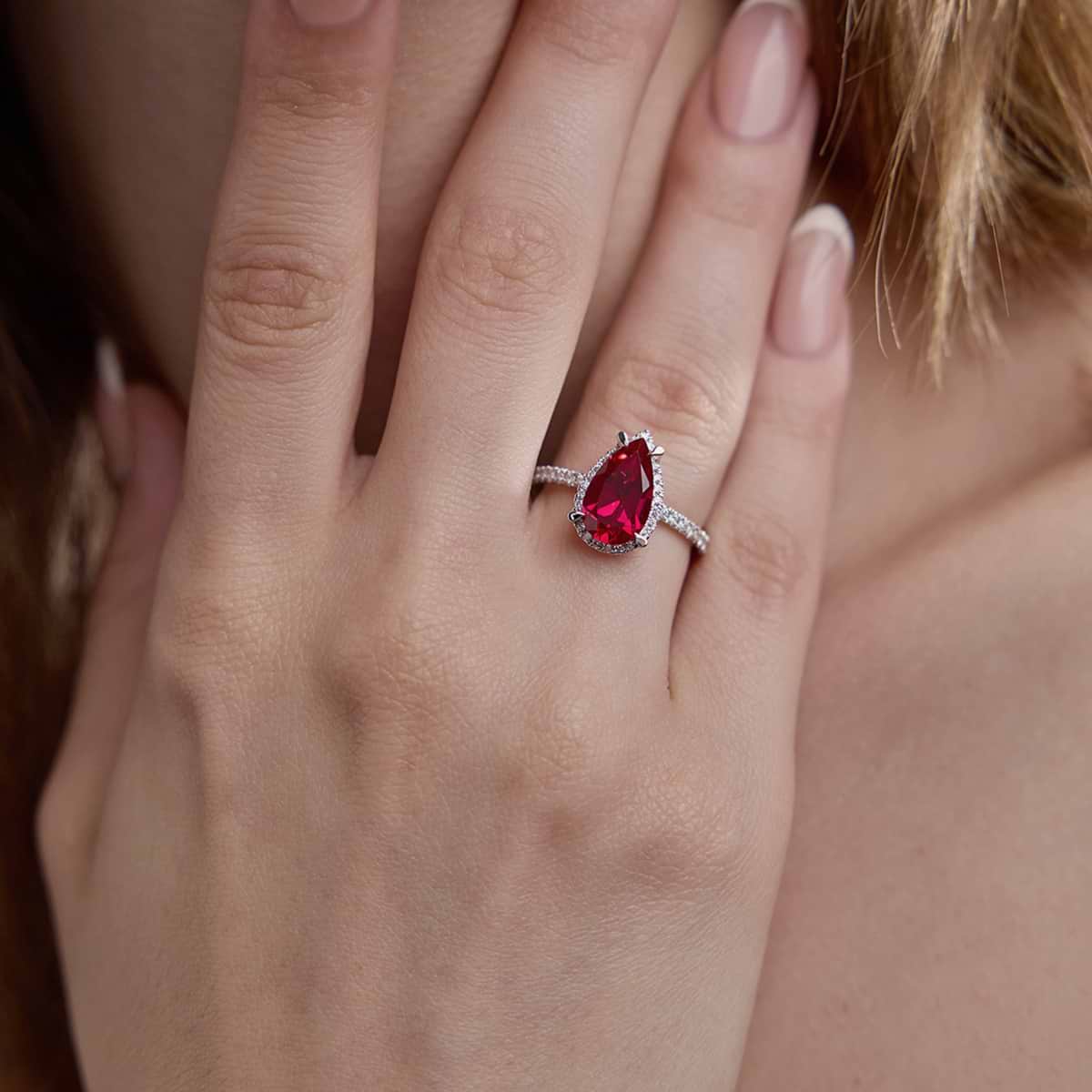 Pear ruby engagement rings discount