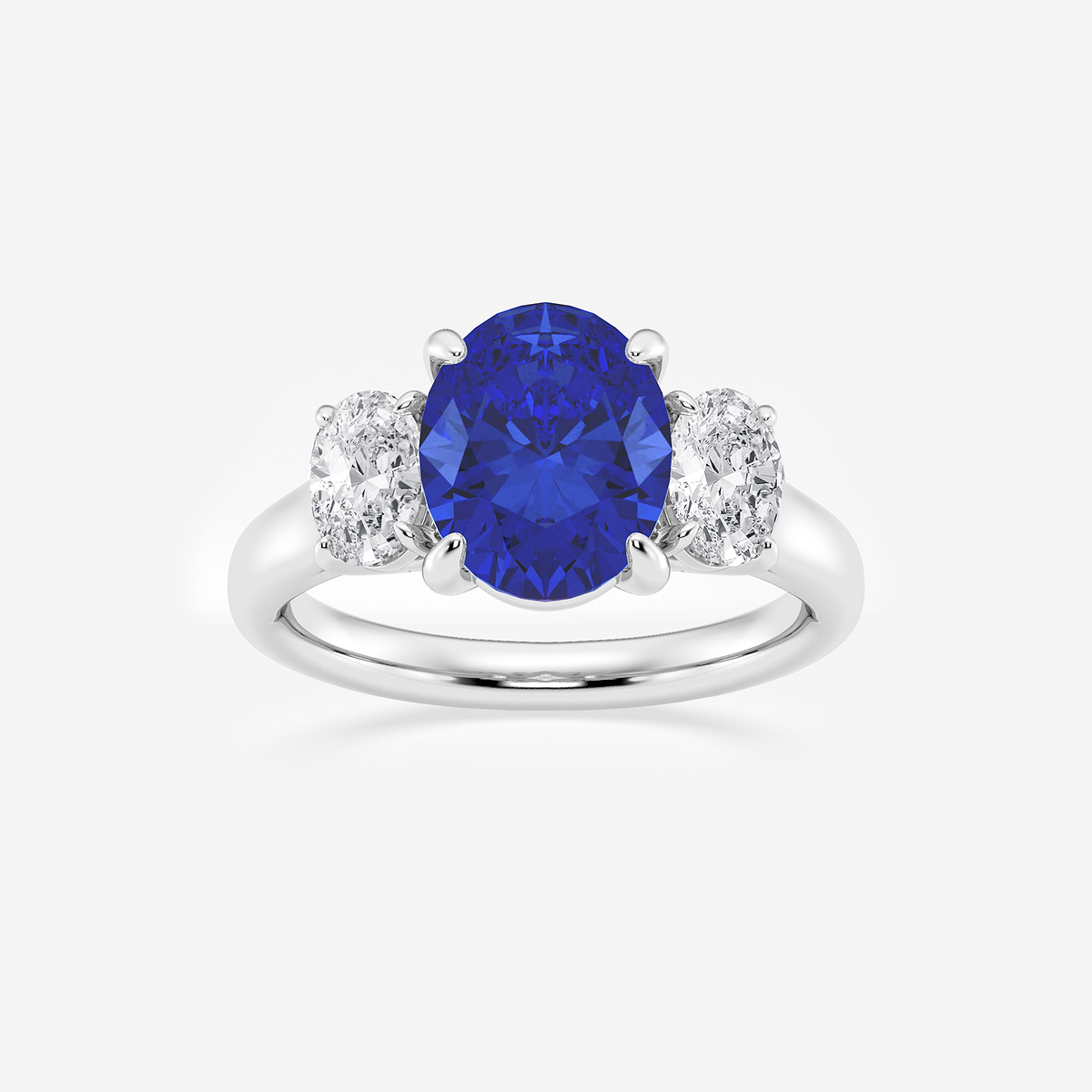 10x8 mm Oval Cut Sapphire and 7/8 ctw Oval Lab Grown Diamond Three-Stone Engagement Ring