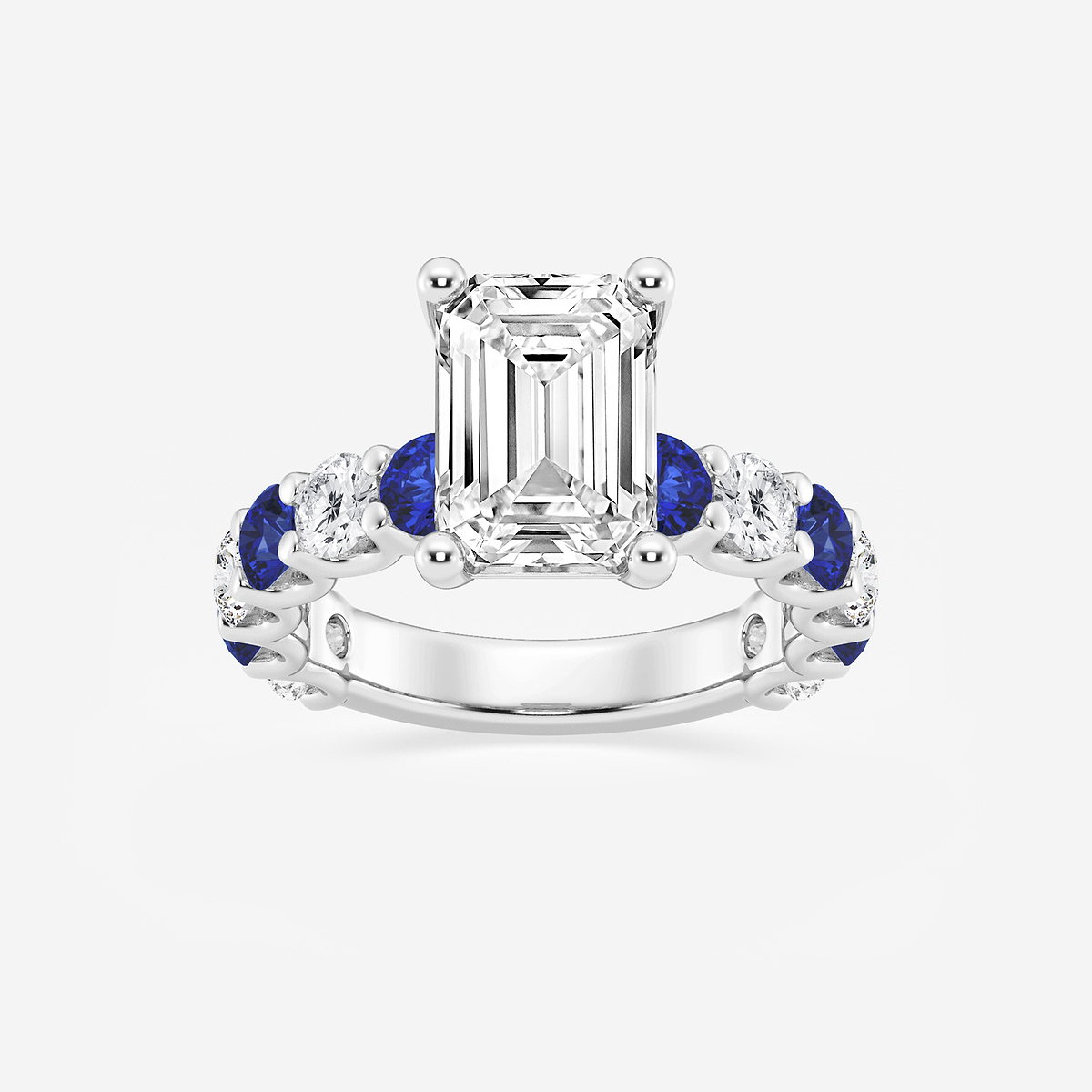 4 ctw Emerald Lab Grown Diamond and 3.5mm Round Created Sapphire Side Stone Engagement Ring