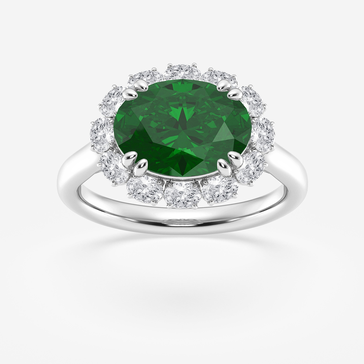 12X9 mm Oval Cut Emerald and 5/8 ctw Oval Lab Grown Diamond Engagement Ring