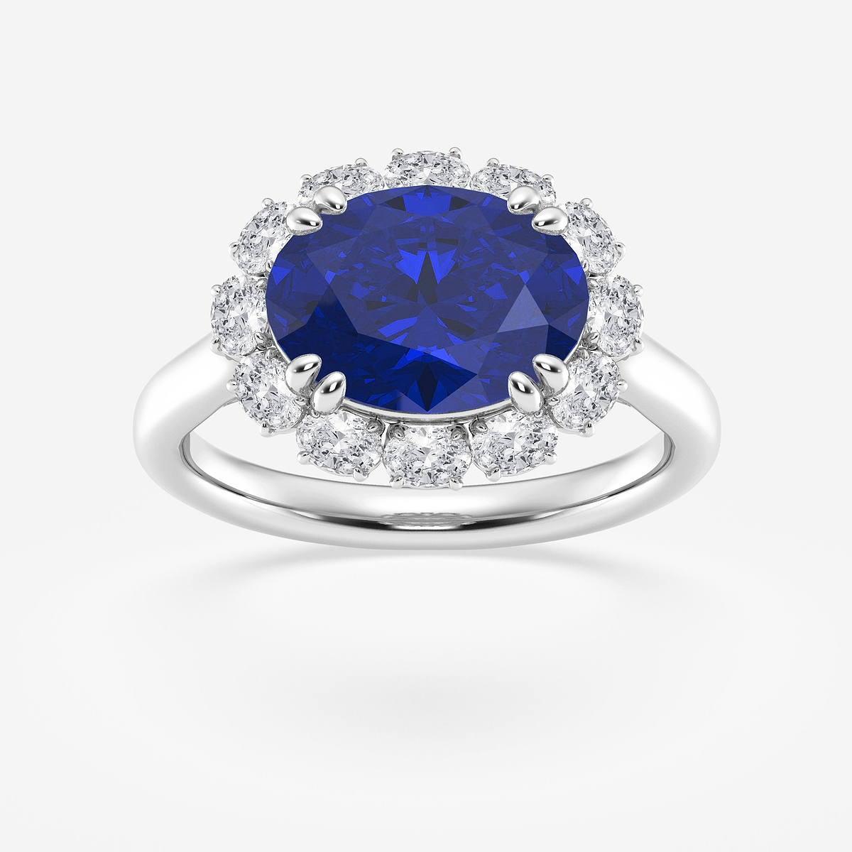 12X9 mm Oval Cut Sapphire and 5/8 ctw Oval Lab Grown Diamond Engagement Ring