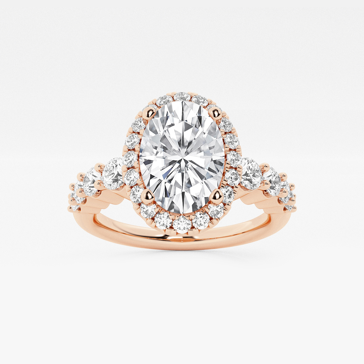 2 1/4 ctw Oval Lab Grown Diamond Graduated Halo Engagement Ring