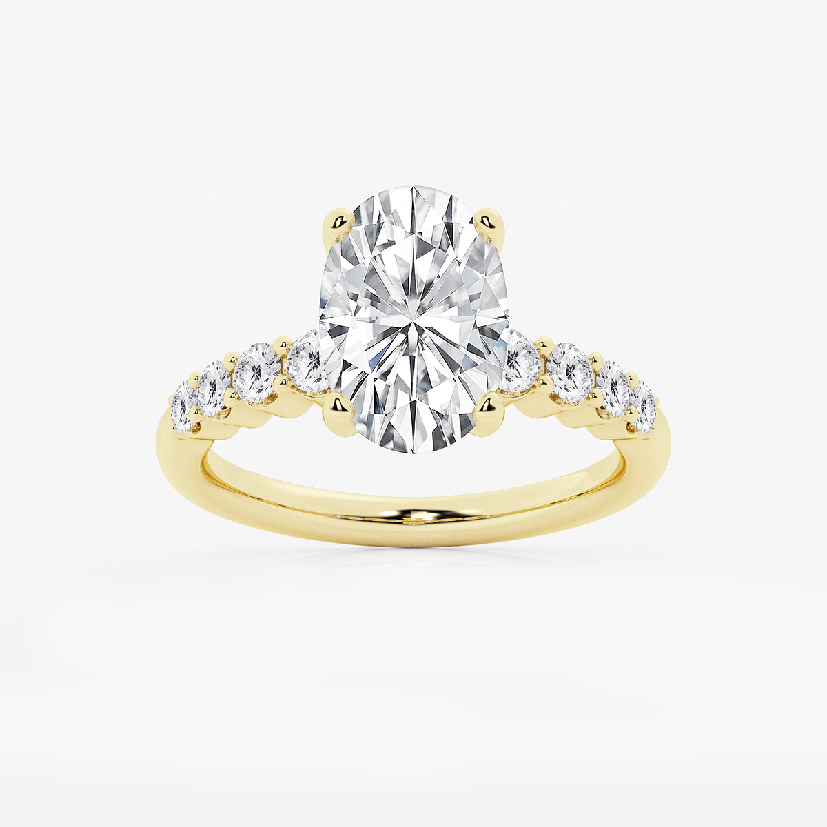 4 1/6 ctw Oval Lab Grown Diamond Graduated Engagement Ring 14K Yellow Gold, E, VS1